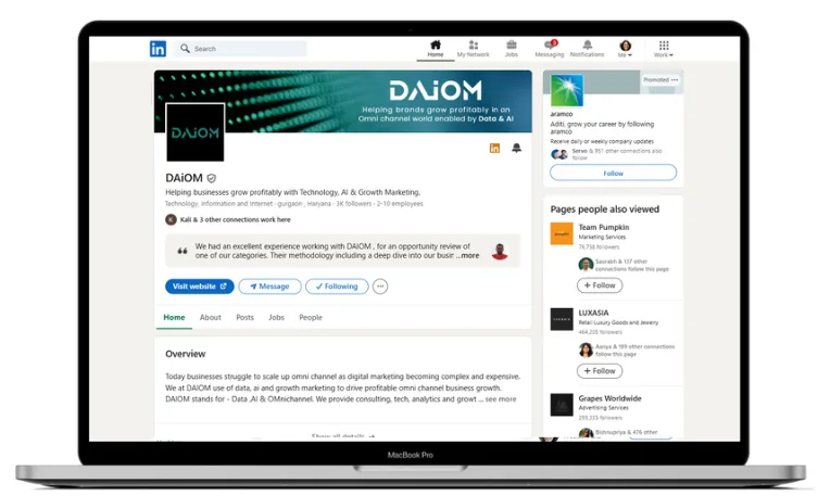 DAiOM company LinkedIn page displayed on a laptop screen showing brand presence